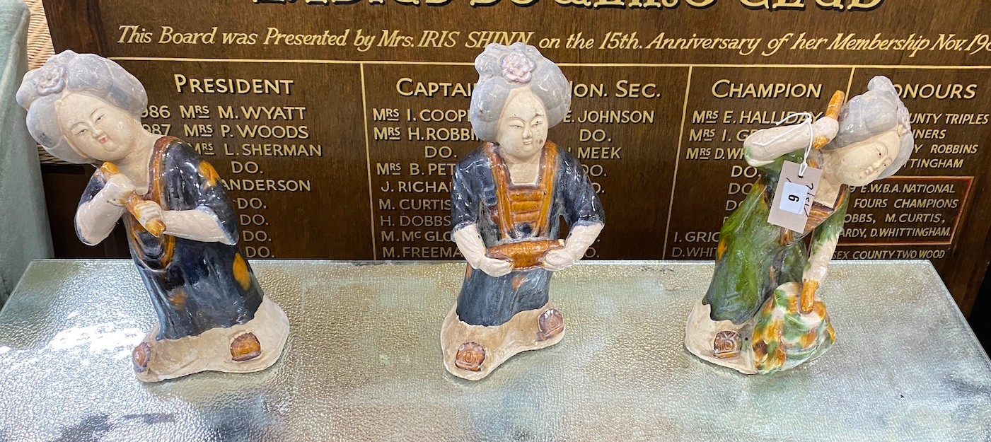 Three Chinese glazed pottery figures of musicians largest height 34cms.